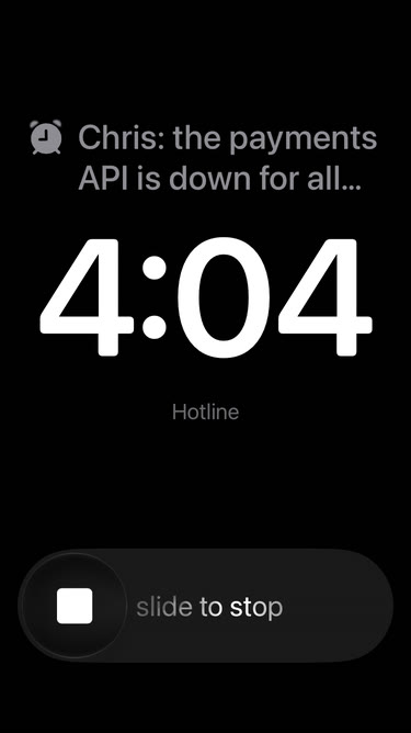 A Hotline alarm ringing on the Lock Screen. The title reads: Chris: the payments API is down for all… followed by the time 4:04, Hotline, and slide to stop.