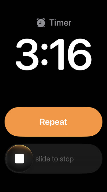A ringing timer on the Lock Screen: the word Timer, the time 3:16, a Repeat button and slide to stop.